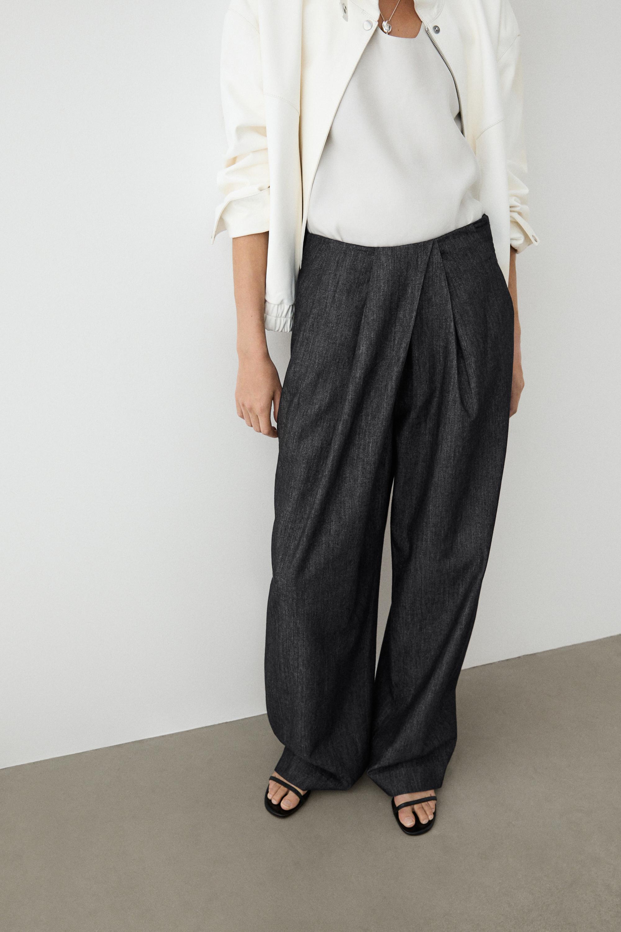 High-waist pants with crossover detail